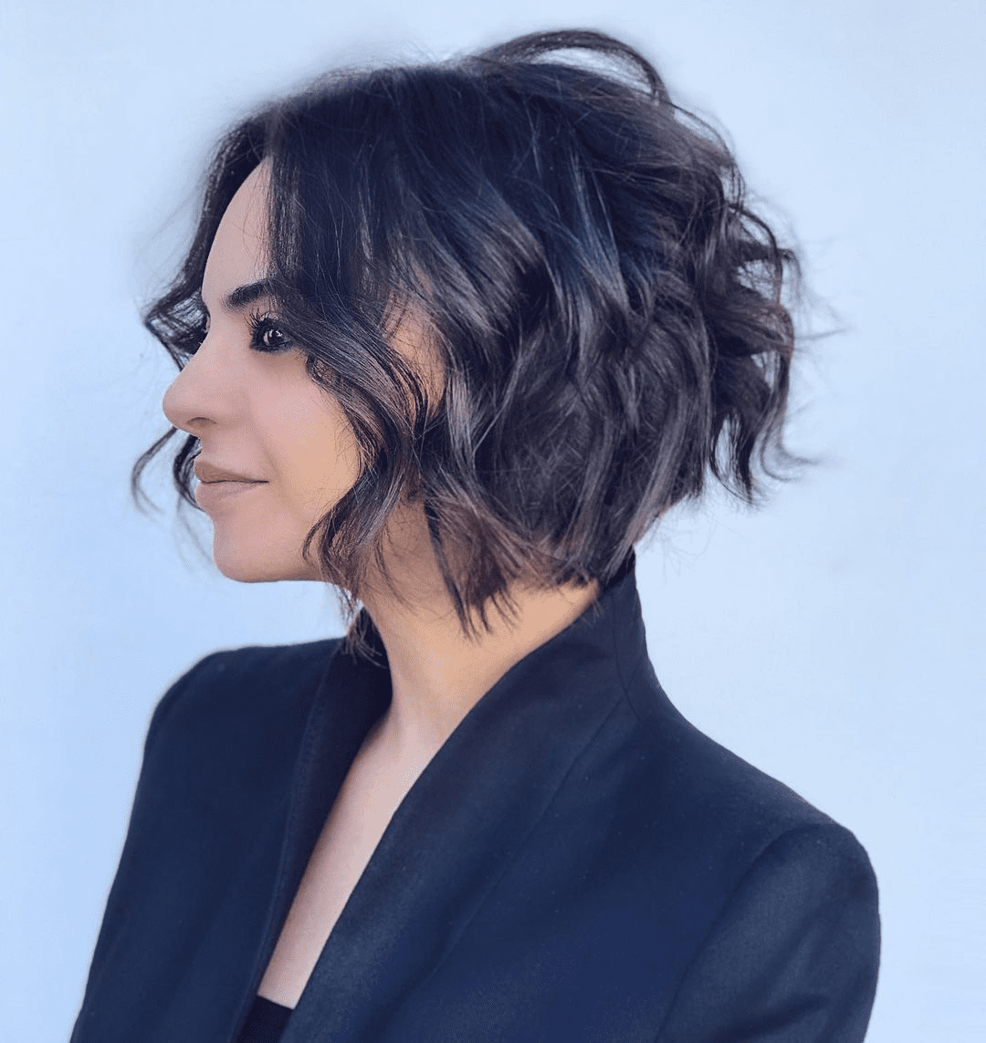 The Trendy Bob with Voluminous Layers and Side-Swept Bangs