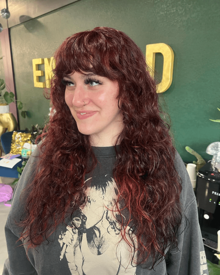 Chocolate Red with Bouncy Curls and Framing Bangs