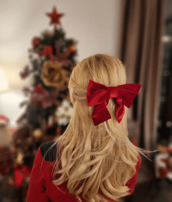 Flowing Waves with Red Ribbon Bow