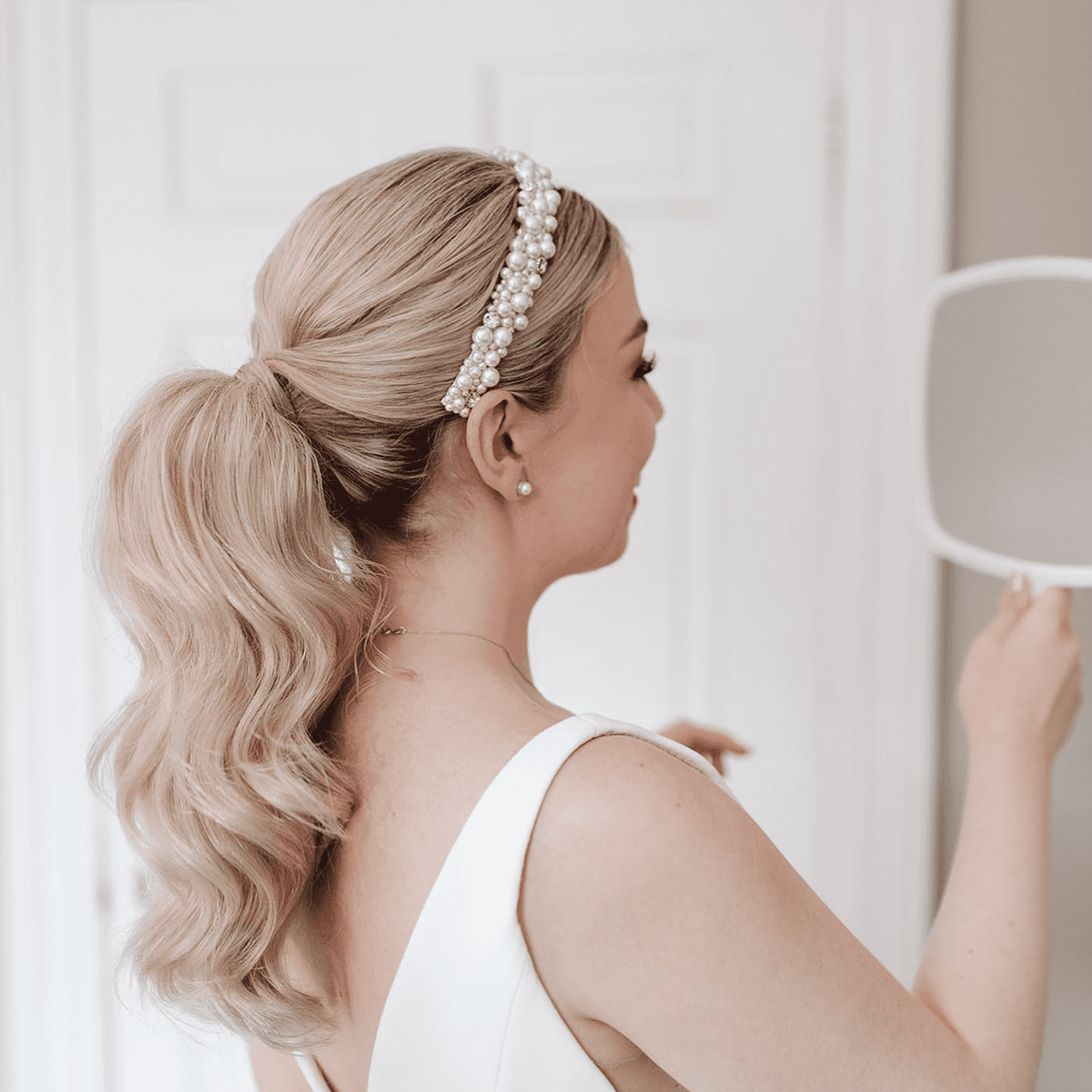 Pearl-Adorned Wavy Ponytail