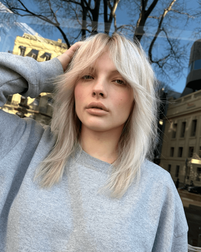 Shaggy Wolfcut with Wispy Layers and Carefree Bangs