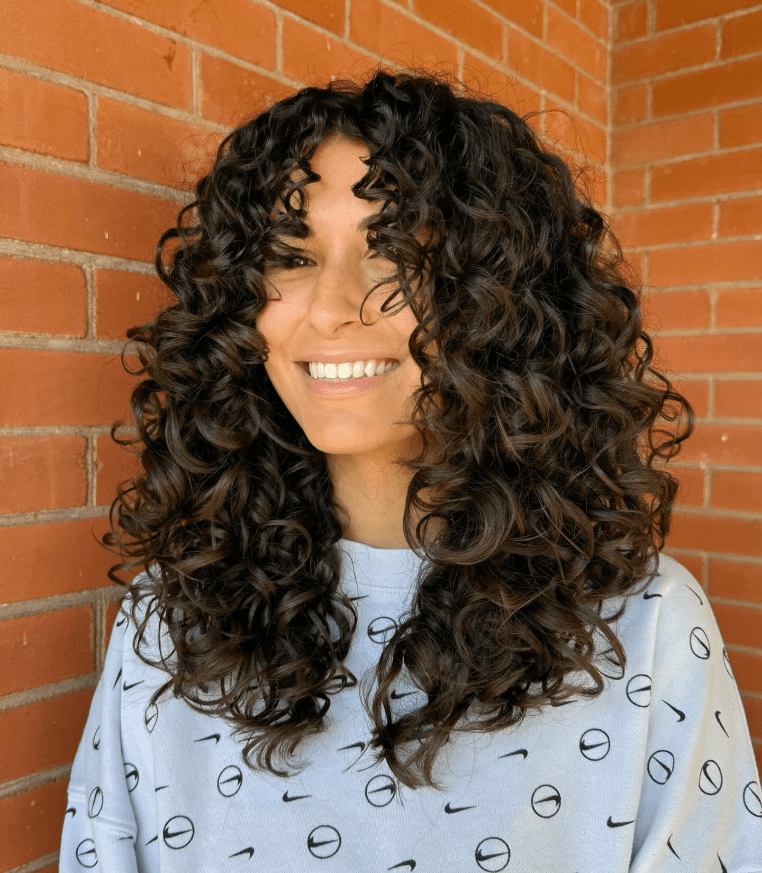30 Charming Face Framing Layers For Curly Hair In 2024
