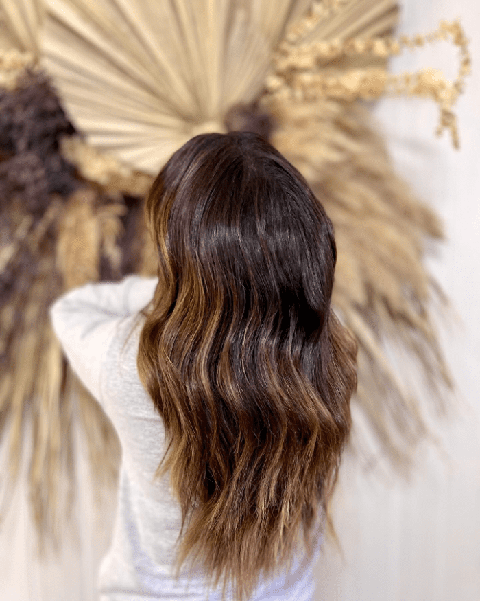 Dark Blonde Waves with Summer-kissed Highlights