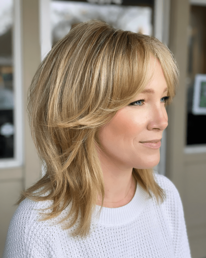 Effortlessly Chic Side-Swept Bangs