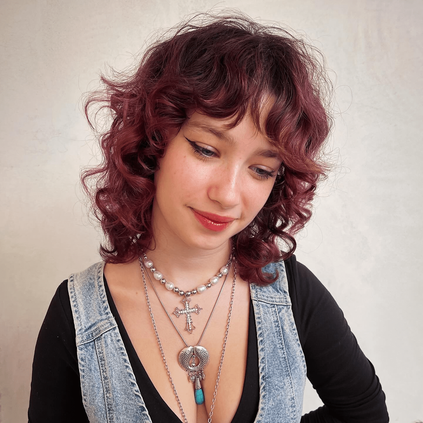 Layered and Vibrant Red Curly Bob