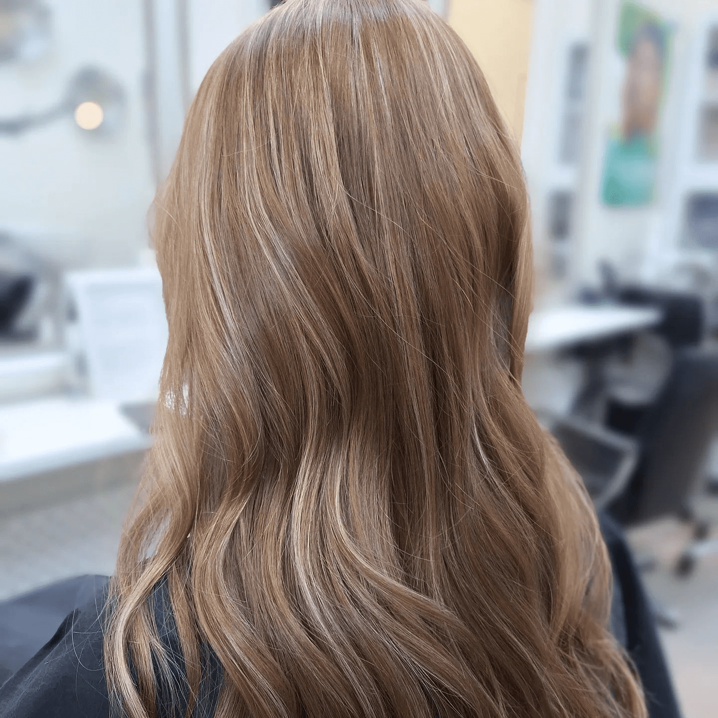 Light Brown Waves with Sun-kissed Highlights