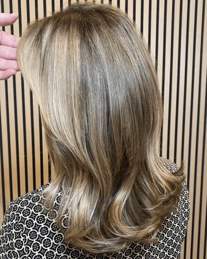 Medium-Length Waves with Honey Blonde Highlights