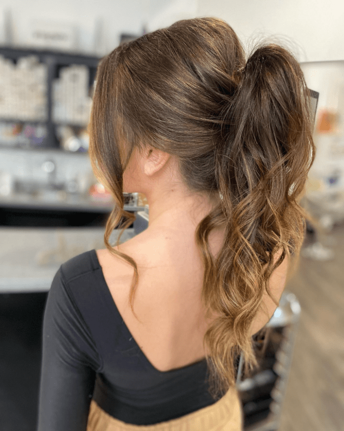 Messy Ponytail with Romantic Curls