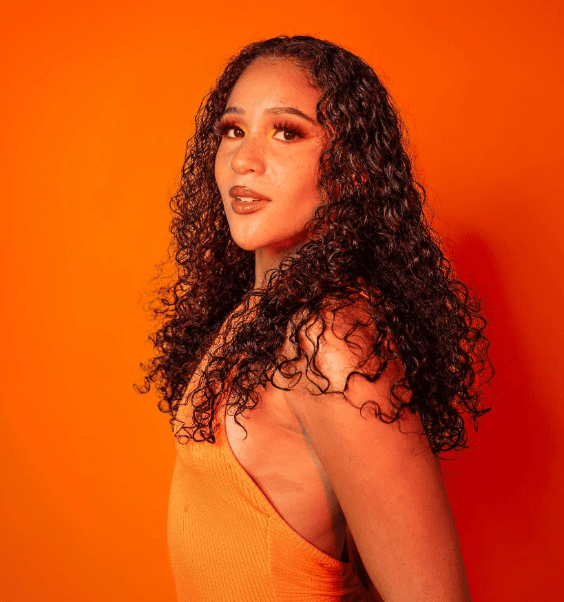 Bold Curls, Empowered Aura