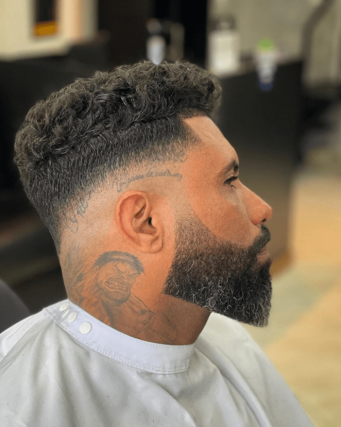 Bold Curls with Edgy Fade