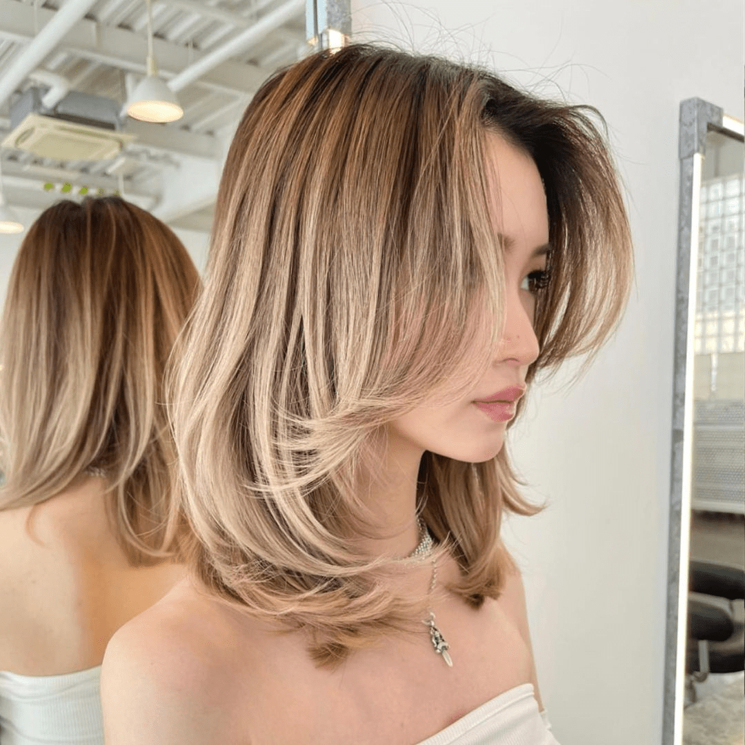 Edgy Asymmetry in Blonde Balayage