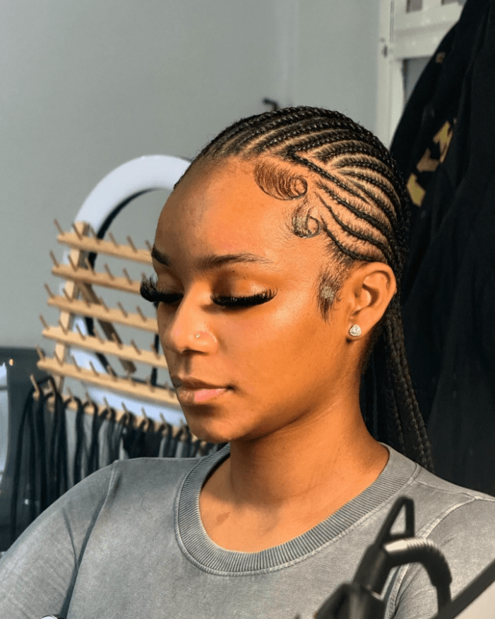 Swirling Symmetry in Cornrows