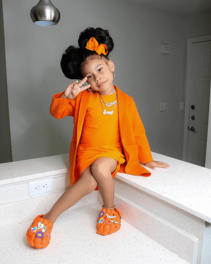 Playful Puffs and Orange Bow