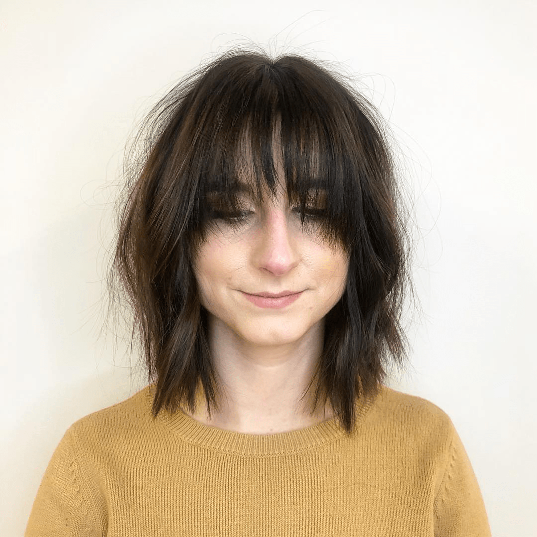 Tousled Elegance with Edgy Bangs