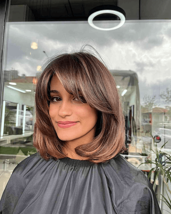 Shoulder-Length Cut with Caramel Tones